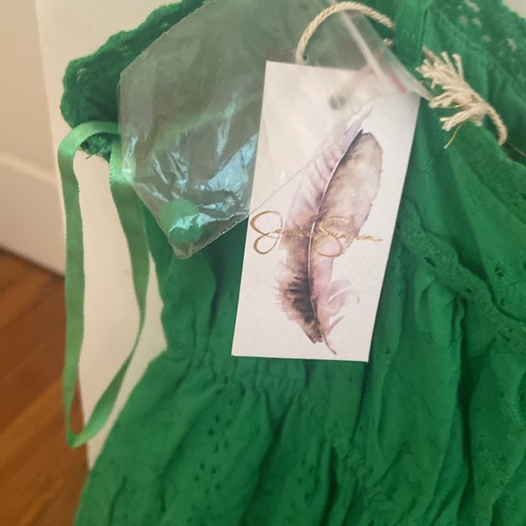Green mini dress. New with tags and extra button. Never been worn. - Picture 3 of 3